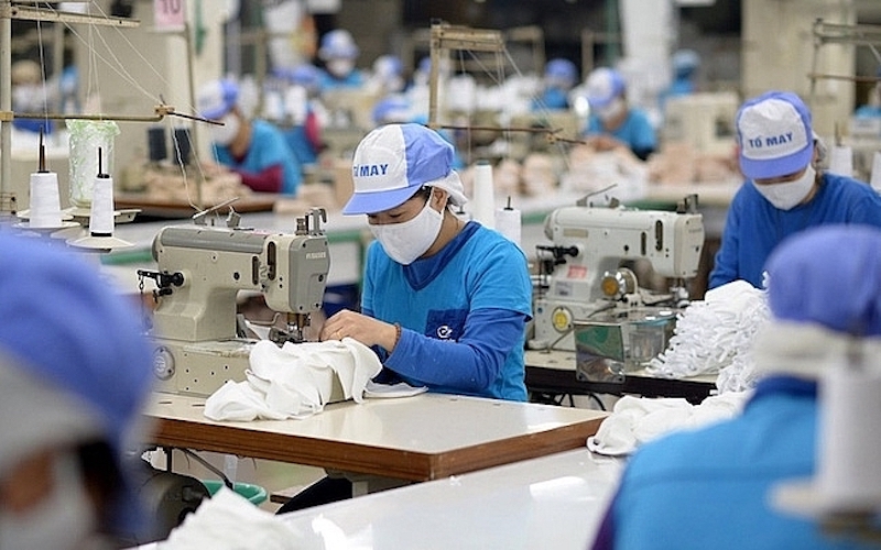Doanh nghiệp dệt may ứng phó chờ thị trường  Doanh nghiệp dệt may ứng phó chờ thị trường