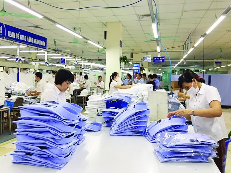 Doanh nghiệp dệt may ứng phó chờ thị trường  Doanh nghiệp dệt may ứng phó chờ thị trường